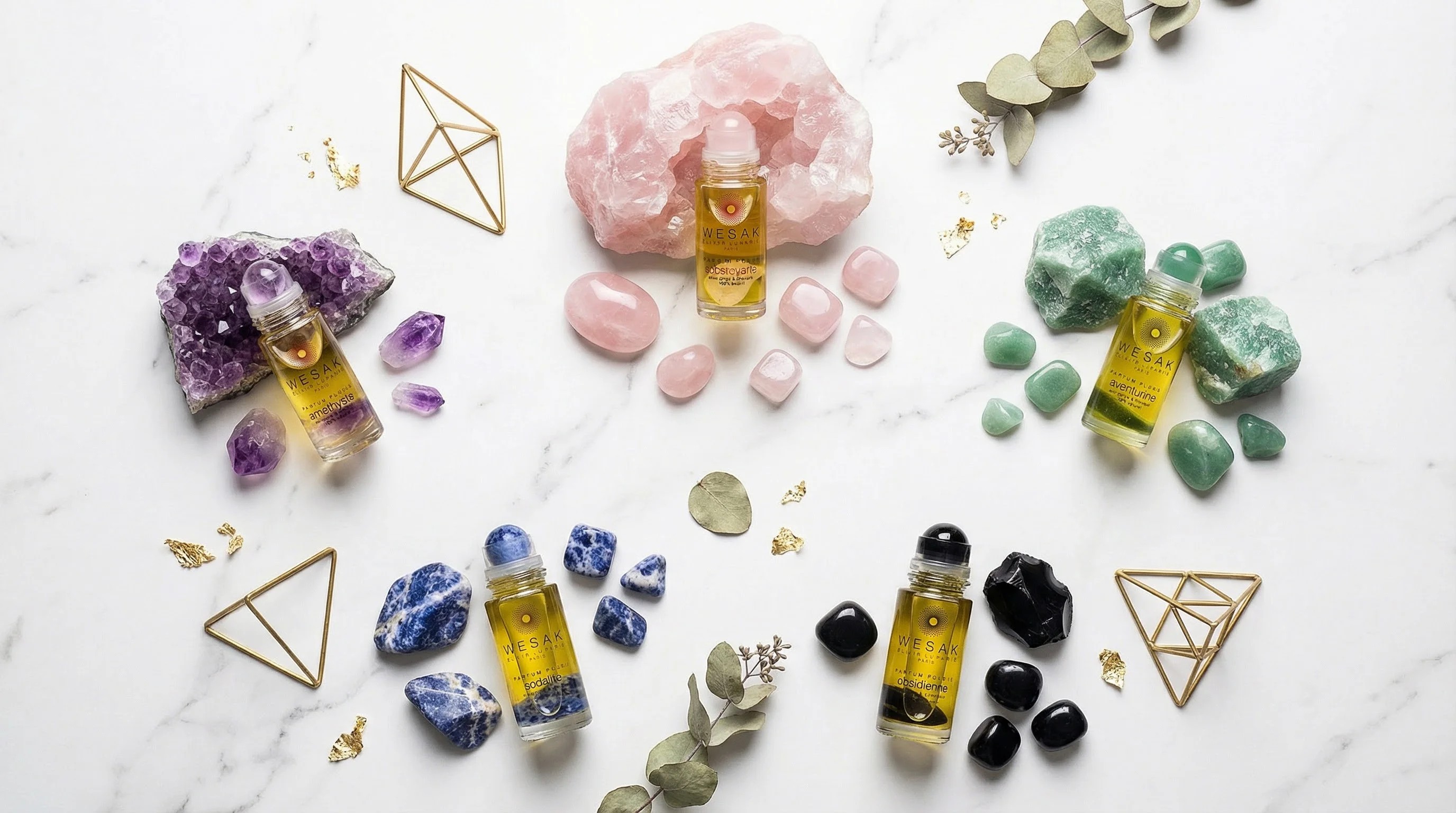 Collection de cristaux et leur symbolique : quartz rose, améthyste, aventurine, sodalite, obsidienne avec élixirs Wesak Paris